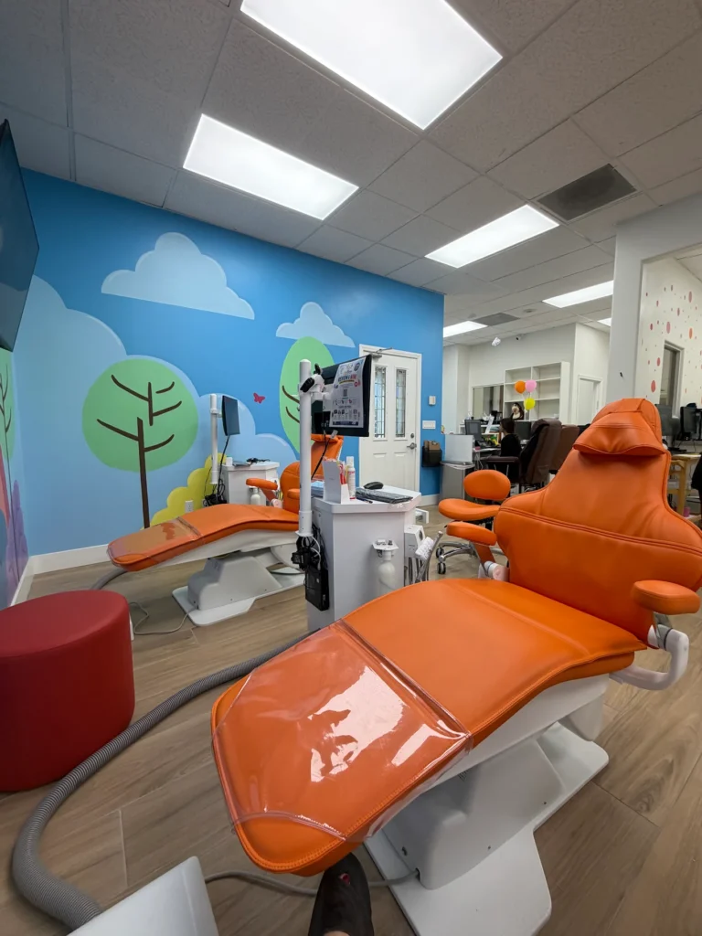 Kids dental office treatment bay with mural near Chino Hills, CA